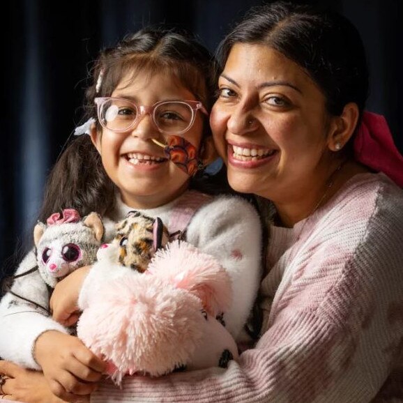 As the family look ahead to more treatment in 2023 and prepare to fight PTLD for the third time, Aru continues to live life with a happy spirit and a big smile for everyone she meets at the RCH. Picture: Mark Stewart