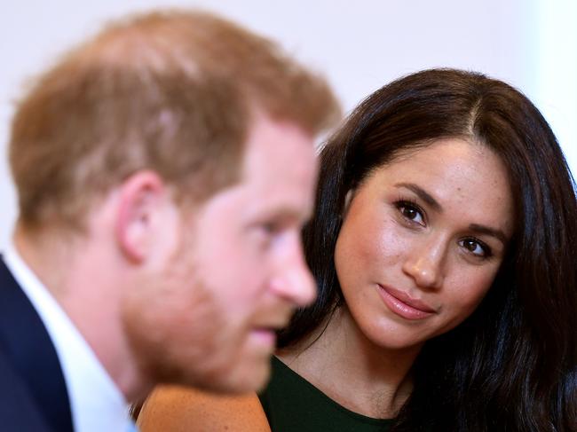 (FILES) In this file photo taken on October 15, 2019 Britain's Prince Harry, Duke of Sussex, and Britain's Meghan, Duchess of Sussex attend the annual WellChild Awards in London on October 15, 2019. - Meghan Markle has revealed she suffered a miscarriage in July this year, writing in the New York Times on November 25, 2020 of the deep grief and loss she endured with her husband Prince Harry. (Photo by TOBY MELVILLE / POOL / AFP)