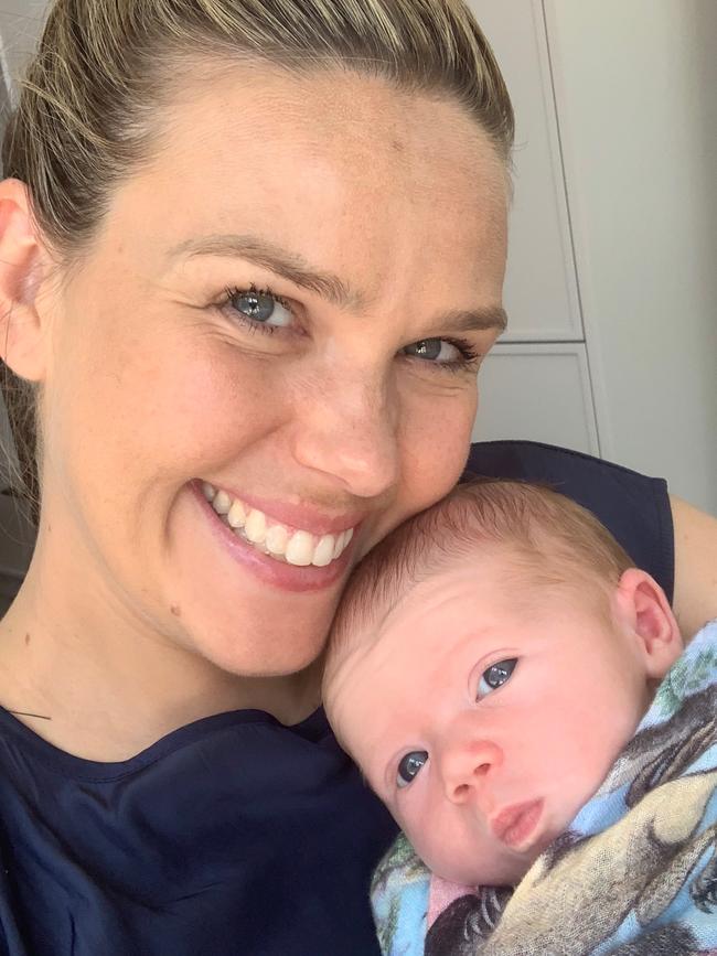 Sunrise reporter Edwina Bartholomew with her two-week old baby Molly yesterday.