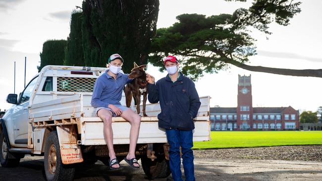 Bourke’s Charlie Mort, with his brother Barney and their kelpie, Barty, pictured last year when they were stranded at Geelong Grammar by border restrictions. Picture: Mark Stewart