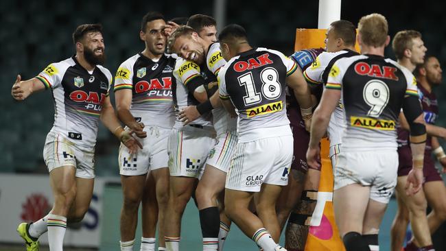 Bryce Cartwright celebrates after scoring a try.