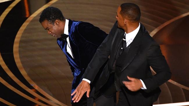 Will Smith slaps Chris Rock onstage during the 2022 Oscars at the Dolby Theatre in Hollywood. Picture: AFP