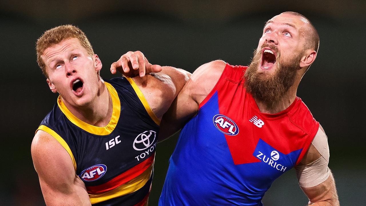 ADELAIDE, AUSTRALIA – AUGUST 05: (L-R) Max Gawn of the Demons and Reilly O'Brien of the Crows compete for the ball during the round 10 AFL match between the Adelaide Crows and the Melbourne Demons at Adelaide Oval on August 05, 2020 in Adelaide, Australia. (Photo by Daniel Kalisz/Getty Images)