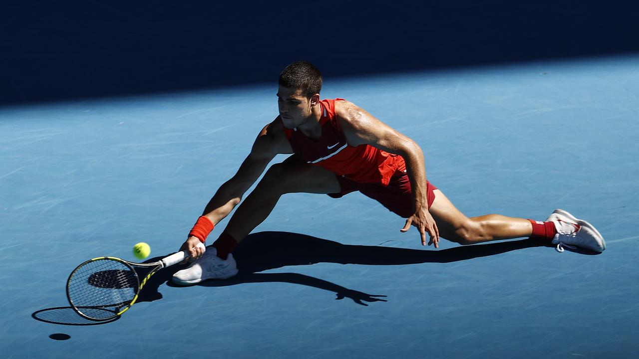 Carlos Alcaraz of Spain plays a forehand