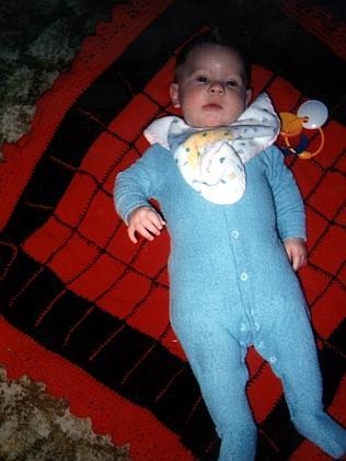 Baby Patrick Folbigg, in a cute blue jumpsuit, died on December 13, 1991 