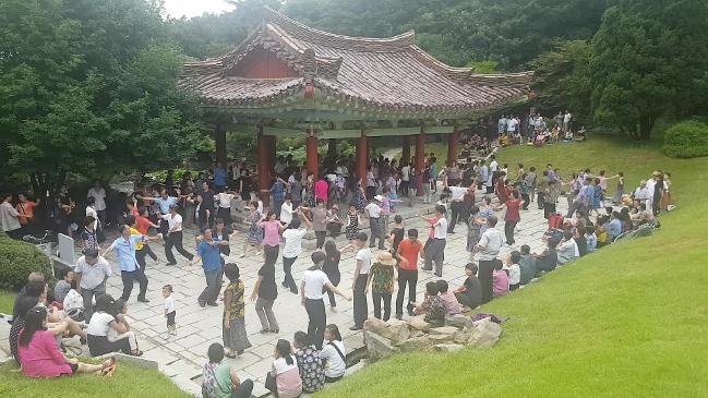 North Korea: Dancing in park