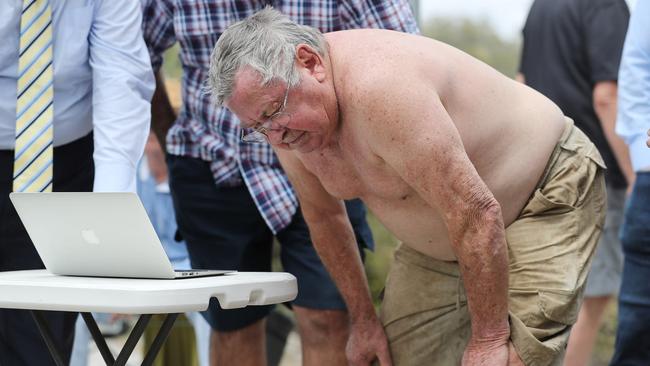 Goodna resident Frank Beaumont wears his mud and filth stained clothes from the day of the floods to hear the class action decision.  Picture: Peter Wallis