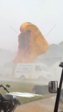 Strong winds sends inflatable slide flying during severe storm