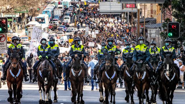 Police ahead of the massive demonstration before clashes broke out. Picture: Julian Andrews