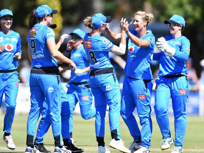 Strikers Sophie Devine and Lauren Winfield celebrate after taking the wicket of Melbourne Stars Mignon du Preez during their 57-run win at Centennial Park Oval, Nuriootpa. Picture: MARK BRAKE/GETTY IMAGES