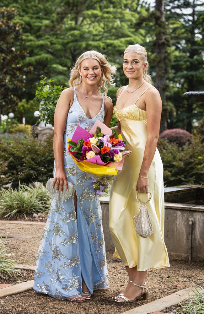 Graduates Mikayla Saunders (left) and Annalise Biggar as Downlands College year 12 students come together for their valedictory mass at the college, Saturday, November 16, 2024. Picture: Kevin Farmer