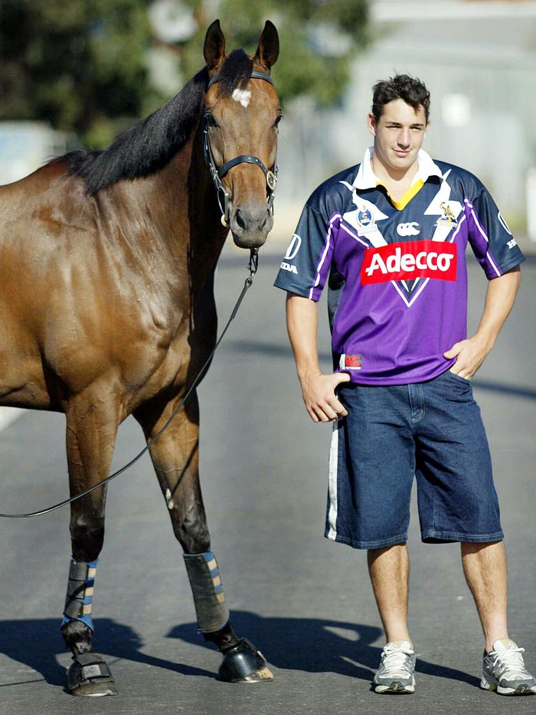 Billy Slater stands with the Matthew Ellerton trained and Group 1 winner Desert Sky.