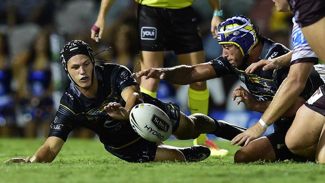 Kalyn Ponga and Johnathan Thurston in action together at the Cowboys. Picture: Wesley Monts