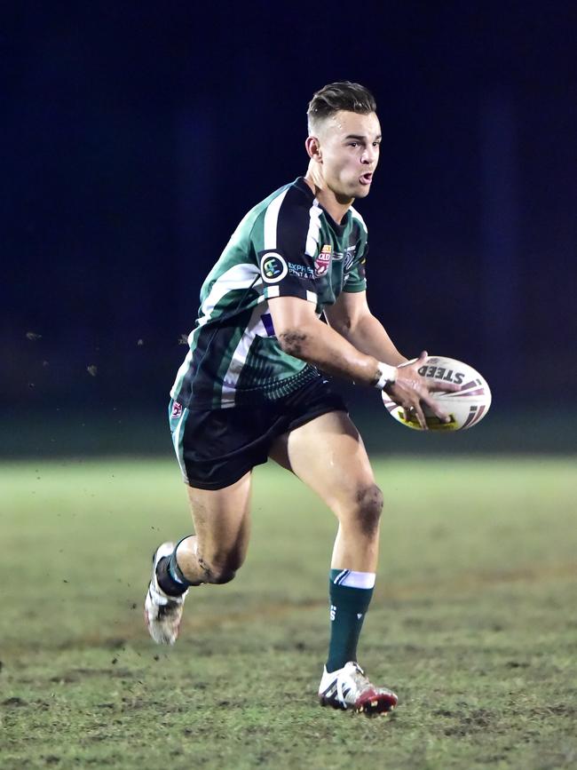 Brad Kent runs the ball for Maroochydore. Photo: Che Chapman