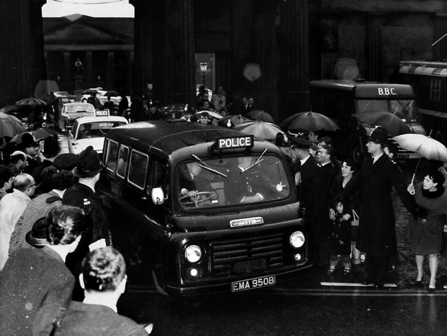 A police van carrying Myra Hindley and Ian Brady leaves Chester Court after both were found guilty of 1965 torture murders of Edward Evans, 17, Lesley Ann Downey, 10, and John Kilbride, 12, in 1966.