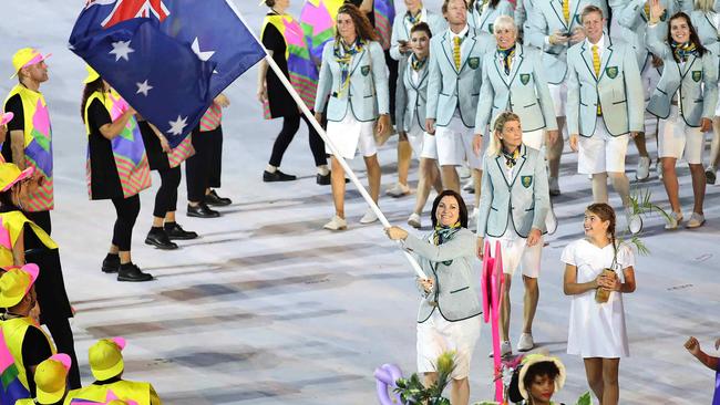 South Australia’s Anna Meares carries the flag during the Opening Ceremony at Rio in 2016. Picture. Brett Costello