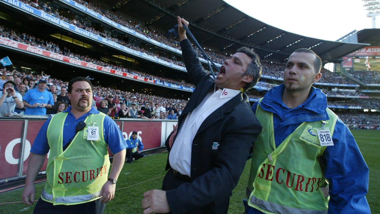 Mark Williams’ famous “choker” reaction after the 2004 grand final win with Port Adelaide.