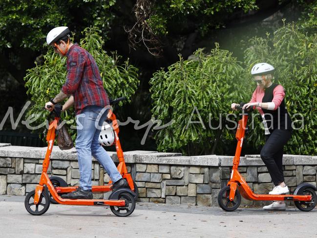 Ben Roberts-Smith taking a scooter ride with his lawyer Monica Allen in Brisbane. Picture: WP Media