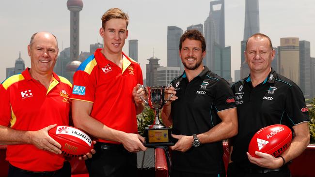 Rodney Eade and Tom Lynch of the Suns with Travis Boak and Ken Hinkley of the Power in Shanghai, China. (Photo by Michael Willson/AFL Media/Getty Images)