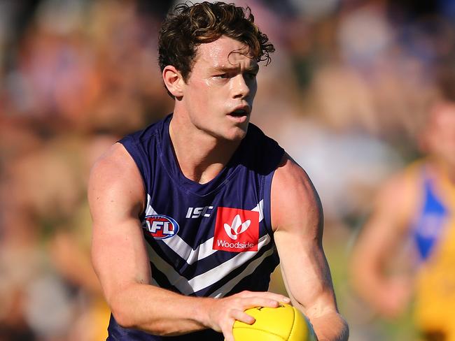 PERTH, AUSTRALIA - MARCH 11: Lachie Neale of the Dockers looks to pass the ball during the JLT Community Series AFL match between the Fremantle Dockers and the West Coast Eagles at HBF Arena on March 11, 2018 in Perth, Australia.  (Photo by Paul Kane/Getty Images)