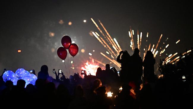 Revellers watch fireworks in Pincio in Rome. Picture: AFP