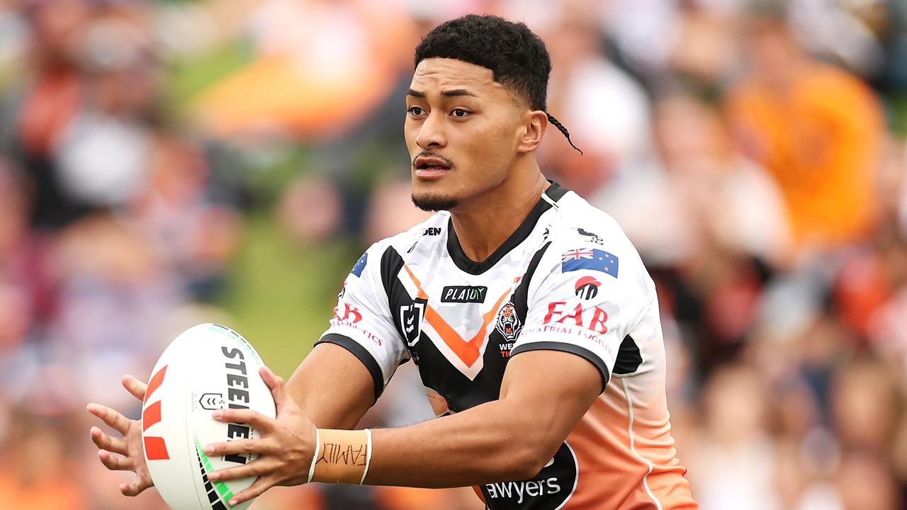 SYDNEY, AUSTRALIA - APRIL 23: Junior Tupou of the Wests Tigers runs the ball during the round eight NRL match between Wests Tigers and Manly Sea Eagles at Campbelltown Stadium on April 23, 2023 in Sydney, Australia. (Photo by Mark Kolbe/Getty Images)