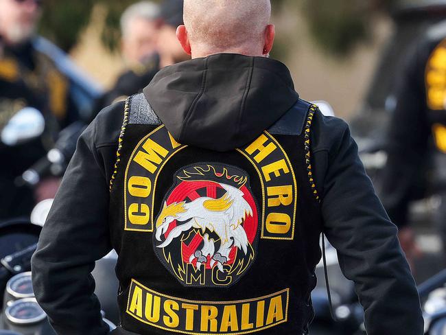 Comanchero Motorcycle Club  members prepare to leave Tooradin after having their identifications checked at the United Petrol Station. Picture : Ian Currie