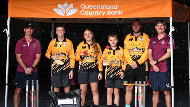 Herbert River Junior Cricket Club members and North Queensland representatives Carter, Amaya and Logan Hague, and president Shawn Hague, flanked by Queensland Cricket ambassadors Tony Hampson and Antony Stewart at Ingham State School. The community is rallying behind the club as it begins to re-build after 1.8m of floodwater destroyed all club equipment during the devastating floods. Picture: Cameron Bates