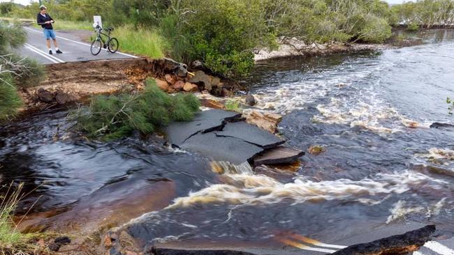 Flooding has washed away Foreshore Dr, Corlette Picture: Facebook/Stephen Keating.