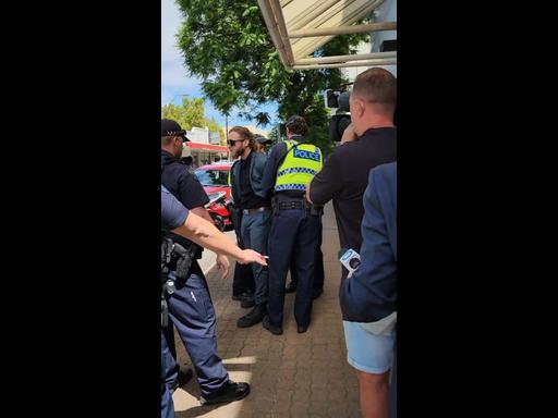 Joel Davis arrested for displaying a Nazi symbol outside Adelaide Watch House