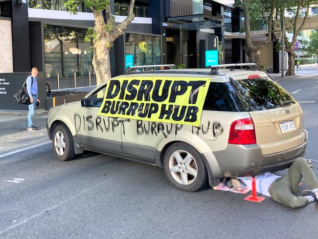 Disrupt Burrup Hub protesters blocked off a busy Perth street on Monday morning. Picture: Disrupt Burrup Hub
