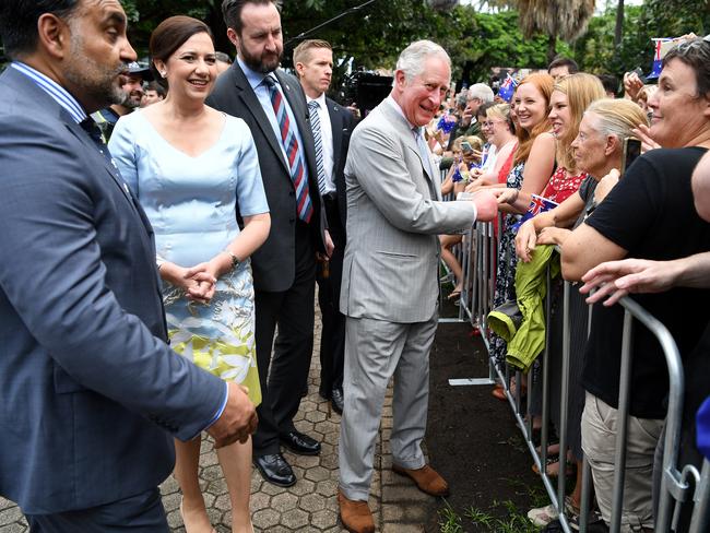 Prince Charles (centre), escorted by Queensland Premier Annastacia Palaszczuk (second left), is greeted by public during a visit to Brisbane. Picture: Dan Peled/AAP