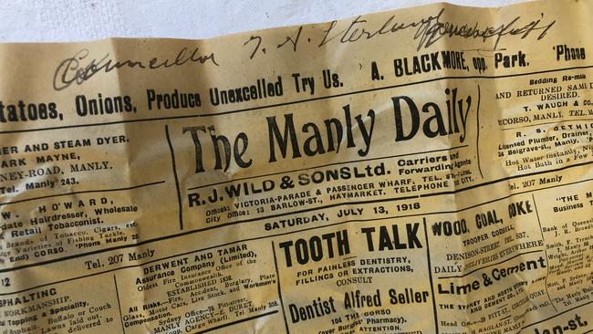 The front page of the Manly Daily, dated July 13, 1918, signed by Thomas Sterland, a Warringah councillor and president of the Harbord Literary Institute, found in a time capsule discovered behind the institute's foundation stone. Picture: Jim O'Rourke