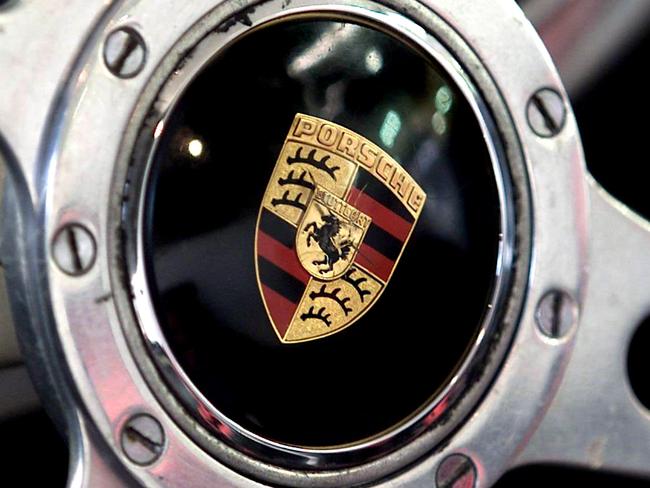 DT MOTOR...Pix show the  Porsche logo for story on dealership in Alexandria and the first ever Porsche made in 1948...pic, SAM RUTTYN