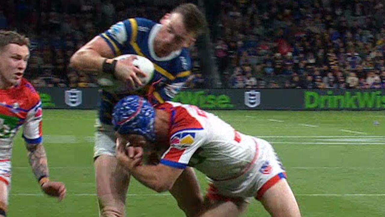 Kalyn Ponga saves a try on Clint Gutherson.
