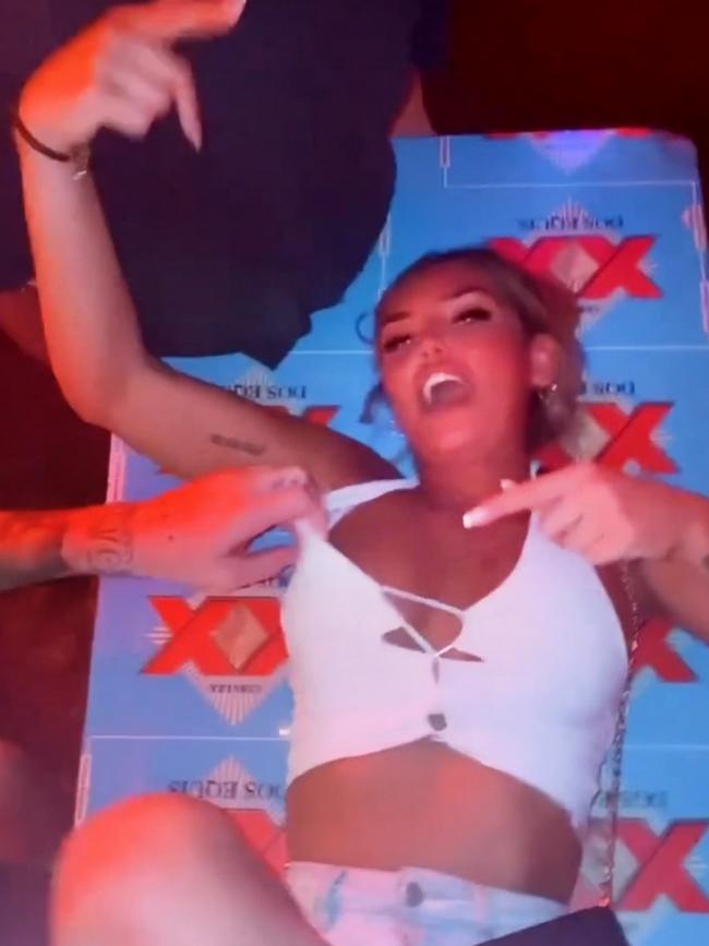 The moment in the video a hand appears to attempt to pull a girl’s top off. Picture: Instagram