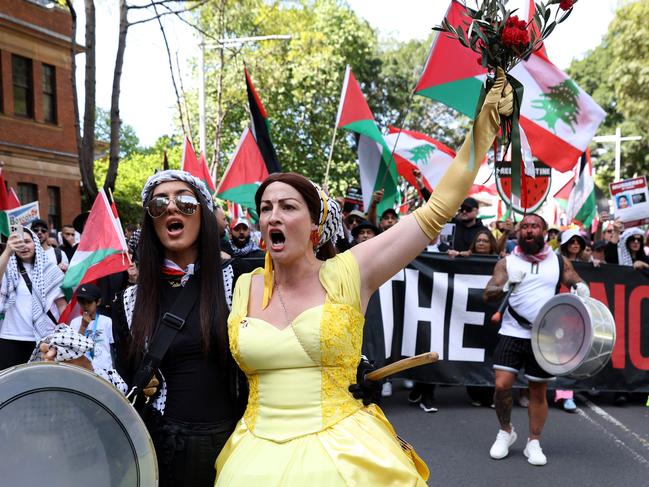 SYDNEY, AUSTRALIA - NewsWire Photos OCTOBER 6, 2024: Protestors march on the streets of the Sydney CBD. Protestors gather at Hyde Park in Sydney's CBD to demand an end to the ongoing war and Israel's current occupation of Gaza, and the escalating Israel-Lebanon conflict.Picture: NewsWire / Damian Shaw