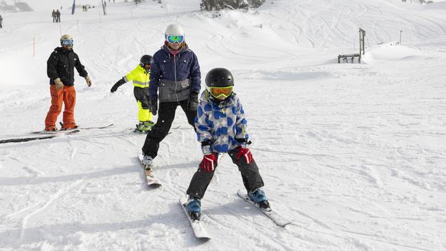 Kids and families have fun on the slopes at Perisher on the opening weekend of the ski season. Picture: Supplied