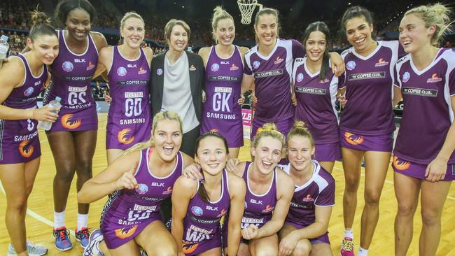 Firebirds players celebrate after winning the ANZ Championship in Brisbane.