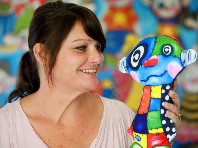 Lalor Park artist Danielle RG with one of her colourful and quirky therapy dolls for mental health. Picture: Angelo Velardo