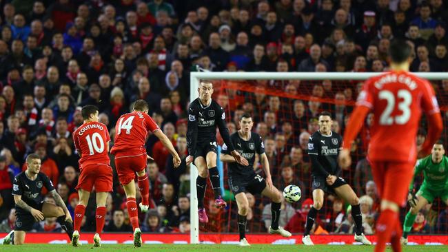 Jordan Henderson of Liverpool unleashes.