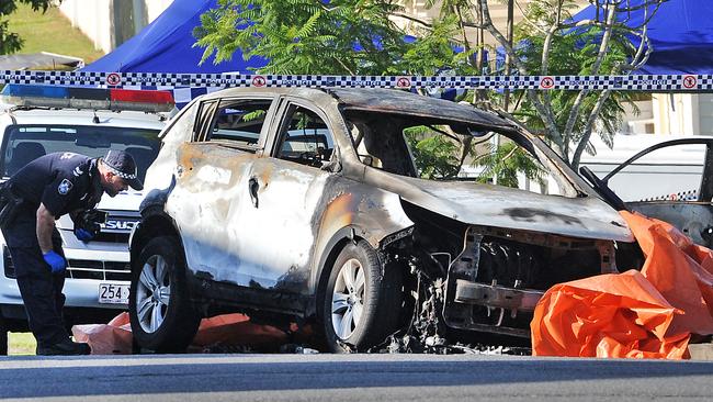 The burnt out car. (AAP image, John Gass)