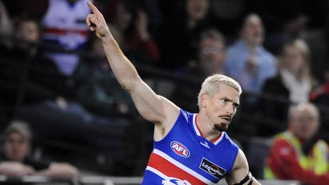 Jason Akermanis celebrates a goal during his career at the Western Bulldogs. Picture: George Salpigtidis