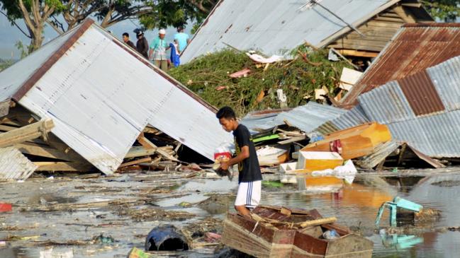 A man surveys the damage caused by earthquake and tsunami in Palu. Picture: AFP