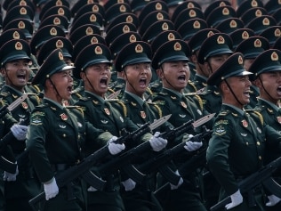 BEIJING, CHINA - OCTOBER 01: Chinese soldiers shout as they march in formation during a parade to celebrate the 70th Anniversary of the founding of the People's Republic of China at Tiananmen Square in 1949, on October 1, 2019 in Beijing, China. (Photo by Kevin Frayer/Getty Images)