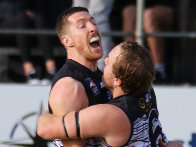 Louis Sharrad and James Batty celebrate a crucial Port District goal against Goodwood. Picture: Kym Stegmeyer