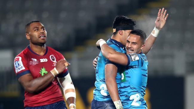 AUCKLAND, NEW ZEALAND - JUNE 29: Sam Nock (R) congratulates  Reiko Ioane of the Blues on his try during the round 17 Super Rugby match between the Blues and the Reds at Eden Park on June 29, 2018 in Auckland, New Zealand.  (Photo by Phil Walter/Getty Images)