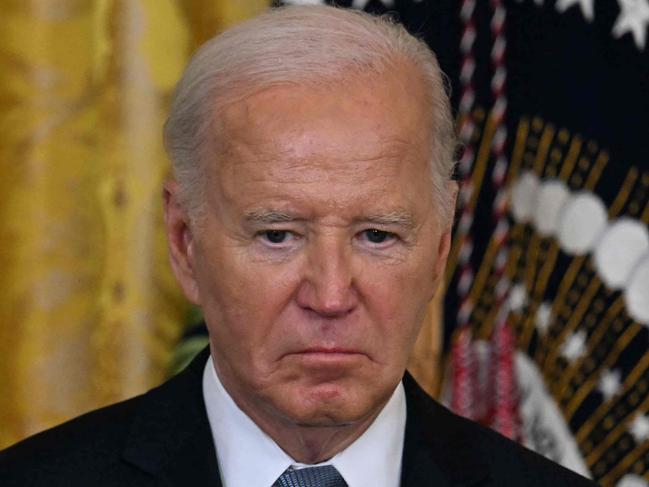 TOPSHOT - US President Joe Biden looks on during a Medal of Honor ceremony in the East Room of the White House in Washington, DC, on July 3, 2024. (Photo by Jim WATSON / AFP)