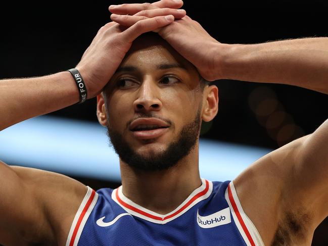 WASHINGTON, DC - DECEMBER 05: Ben Simmons #25 of the Philadelphia 76ers reacts against the Washington Wizards during the first half at Capital One Arena on December 5, 2019 in Washington, DC. NOTE TO USER: User expressly acknowledges and agrees that, by downloading and or using this photograph, User is consenting to the terms and conditions of the Getty Images License Agreement.   Patrick Smith/Getty Images/AFP == FOR NEWSPAPERS, INTERNET, TELCOS & TELEVISION USE ONLY ==