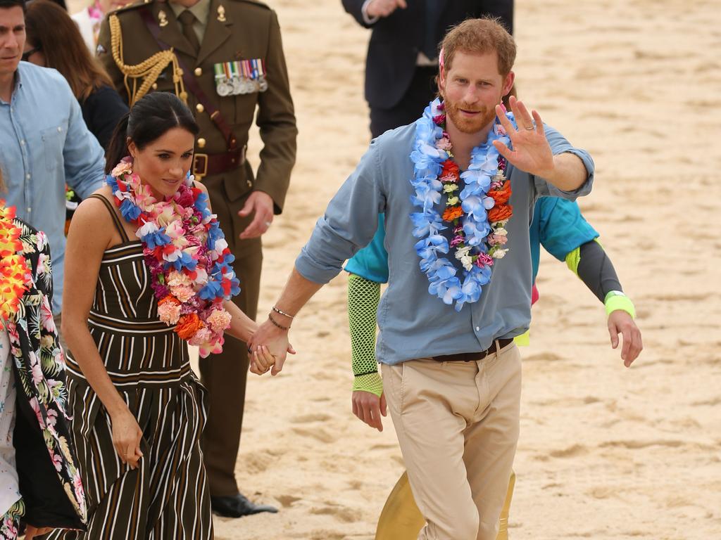 DAILY TELEGRAPH - Pictured is the Duke and Duchess of Sussex, Prince Harry and wife Meghan at Bondi Beach today on their Royal tour of Australia. Picture: Tim Hunter